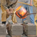 Pouring molten brass